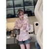 Ảnh của Áo sơ mi cổ bèo thêu hoa