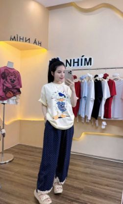 Ảnh của set bộ áo vịt quần chấm bi kèm chun tóc