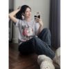 Ảnh của Set bộ áo cô gái tai nghe mix quần kẻ